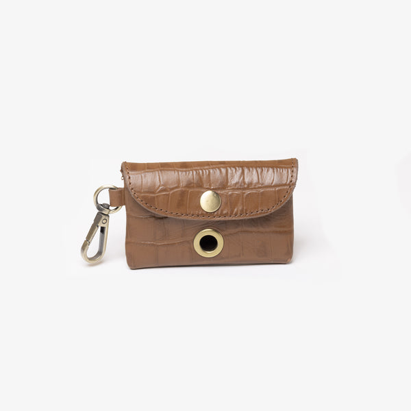 un joli porte sac à crotte en cuir haut de gamme couleur caramel